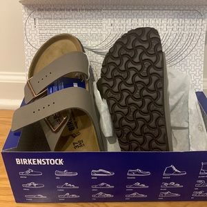 Arizona Birkibuc Birkenstock Sandals in the color Stone